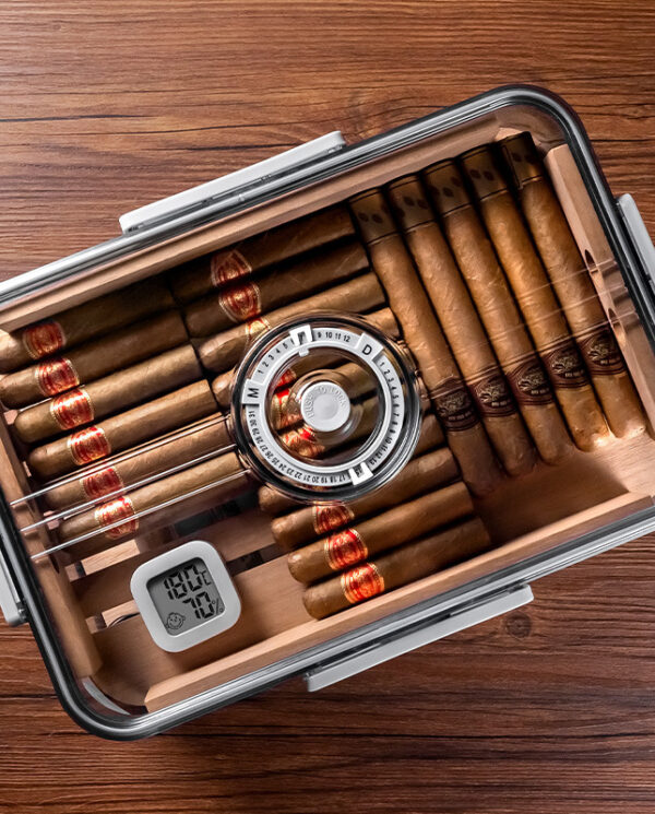 CH001-02 Open cigar humidor on a wooden table with neatly arranged cigars, a circular lock, and a digital hygrometer showing conditions