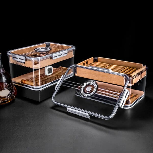 CH001-03 Set of clear acrylic cigar humidors with wooden interiors and cigars, a round hygrometer visible on the lid.