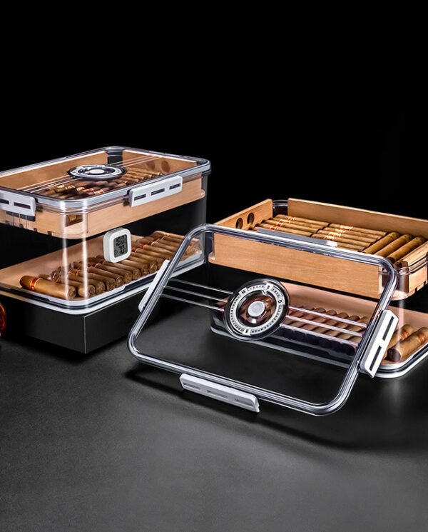 CH001-03 Set of clear acrylic cigar humidors with wooden interiors and cigars, a round hygrometer visible on the lid.