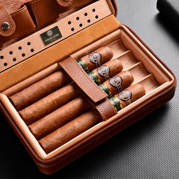 Open brown leather cigar humidor containing five cigars with green bands and a Cigarlounge label visible on the tray edge.