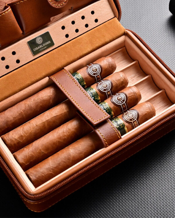 Open brown leather cigar humidor containing five cigars with green bands and a Cigarlounge label visible on the tray edge.