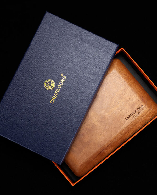 CH004-03 Blue gift box with gold logo opens to reveal a brown leather cigar case inside an orange-lined box with a black interior.