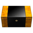 Luxurious black lacquer storage box with burl wood panels on the sides and a gold lock.