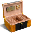 Open wooden cigar humidor with three divided trays, brass hinges, and a brass hygrometer on the lid (humidor interior shown).