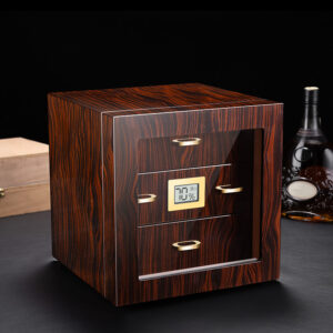 Wooden cabinet-style device with a small digital humidity display showing 70% and gold drawer handles on a dark surface.