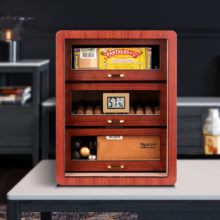 Wooden cigar humidor with glass panels showing cigars and a digital hygrometer reading 57% humidity.