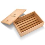 Open cedar travel cigar box with five cigars arranged inside