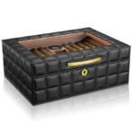 Black quilted leather cigar humidor with a glass lid, showing cigars inside and a gold plaque reading CIGARLOONG on the front edge with a keyhole below it.