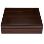 Dark polished wooden rectangular box with the lid closed, showing a rich wood grain surface.