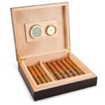 Open wooden cigar humidor with cigars arranged in divided storage