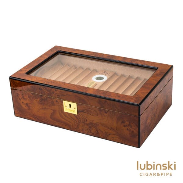 CH020 Wooden cigar humidor with a glass lid, burl wood finish, and lined interior for cigars; Lubinski Cigars & Pipe logo visible in the corner.