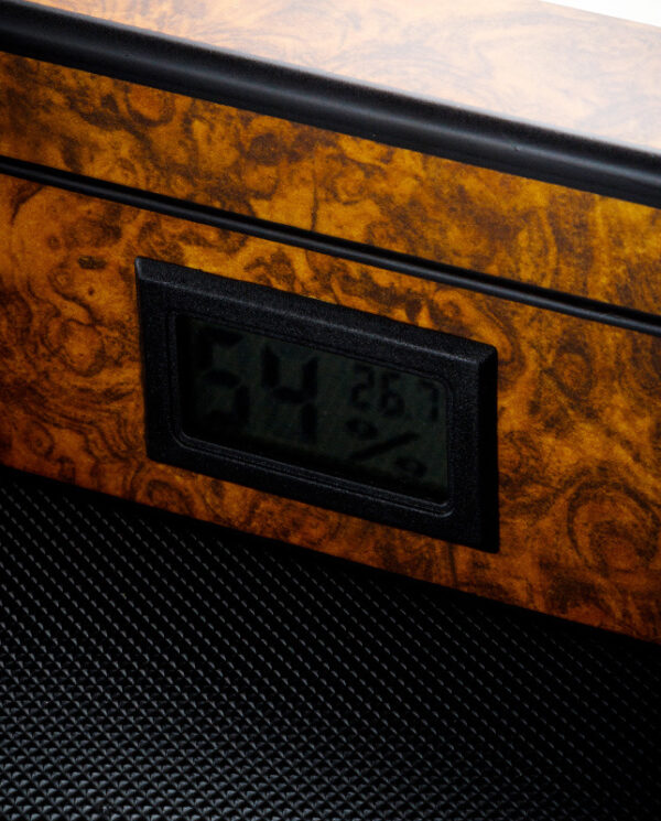 CH021-02 Digital humidity and temperature display embedded in a burl wood panel showing 54% and 26.7°C.
