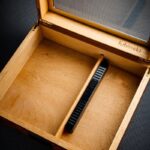 Open LUBINSKI cedar humidor with portable humidity meter inside