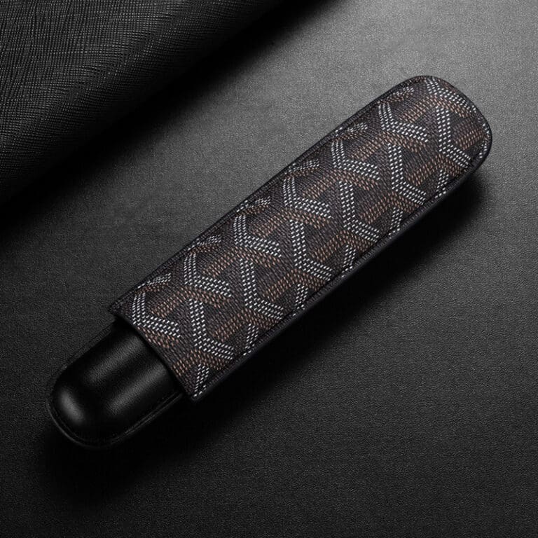 CL030-01 Slim device wrapped in a brown patterned fabric sleeve on a dark surface, showing a chevron-like design and black ends.