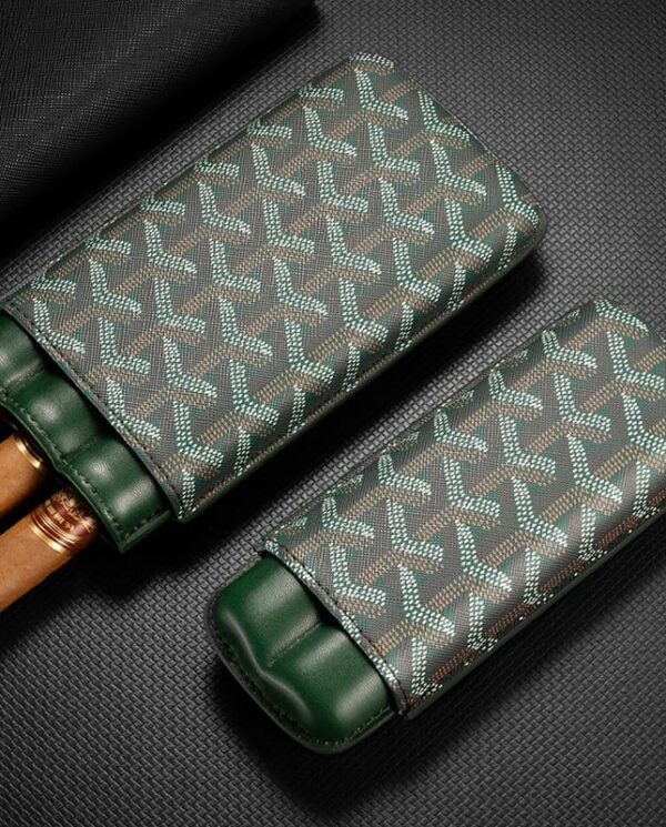 CL031-02 Green patterned leather cigar case with two cigars partially exposed at the open end, on a dark textured surface.