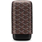 Brown patterned clutch-style bag with a geometric white chevron motif on a dark brown background, and a black base.