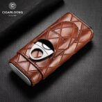 Brown quilted leather car key fob case with a metallic ring grip on a dark textured background (CIGARLOONG branding)