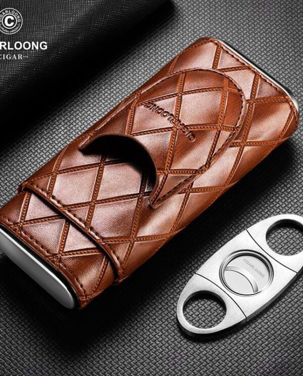 CL032-03 Brown quilted leather cigar case with a flap closure placed beside a metal cigar cutter on a textured black background.