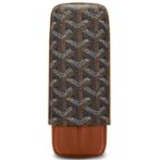 Rectangular glasses case with a brown leather bottom and a dark monogram-patterned fabric body.