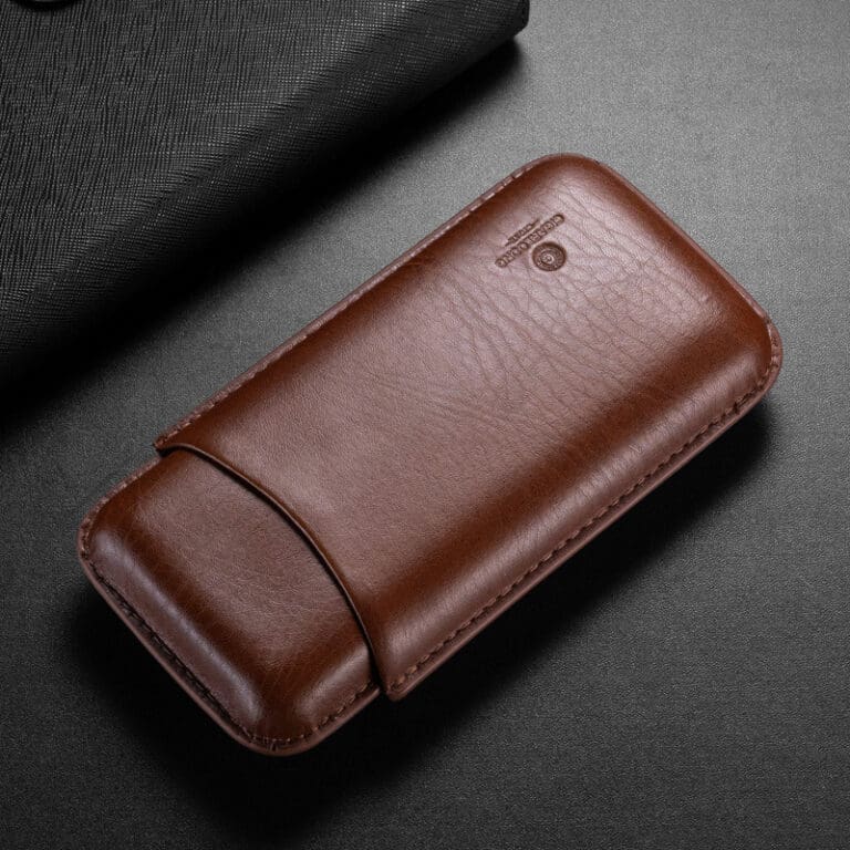 Brown leather wallet-style phone case with a curved flap on a dark surface.