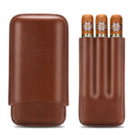 Brown leather triple-slot cigar case with three cigars partially visible in the open slots.