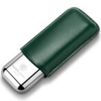 Green leather-covered metal lighter with a chrome bottom, shown at an angle.