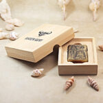 Full presentation view of the engraved Grotto Buddha Zippo Armor lighter