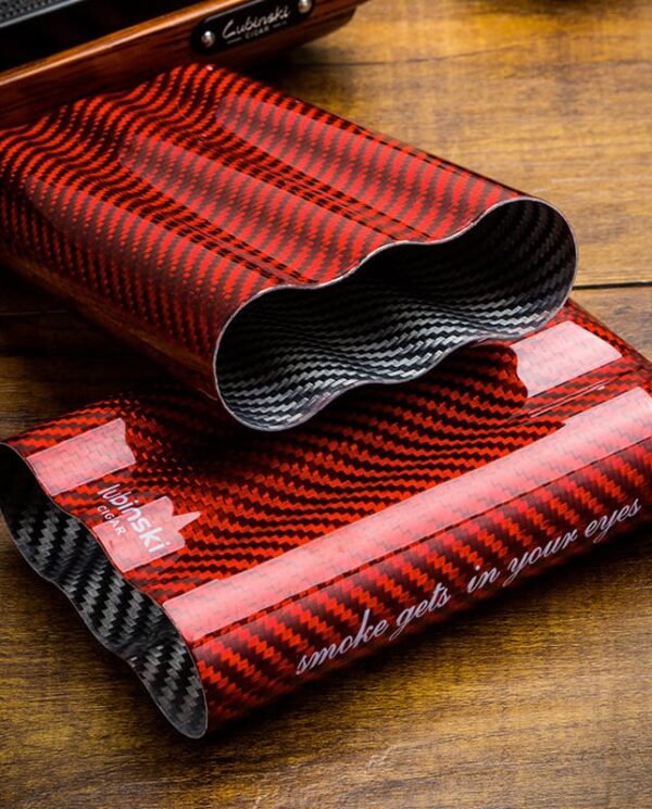 Red and black carbon fiber-patterned curved sleeve with an outer tube, featuring the phrase 'smoke gets in your eyes' along the side.