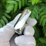 Camel Wides limited-edition sterling silver Zippo lighter – angled polished top view of the Camel Wides limited-edition lighter