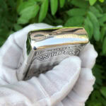 Camel Wides limited-edition sterling silver Zippo lighter – second top-edge view above the engraved Wides panel