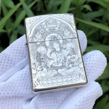White Tara five-side sterling silver Zippo lighter – front view showing White Tara seated on a lotus beneath an engraved halo