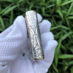 White Tara five-side sterling silver Zippo lighter – opposite narrow-side view with lotus and botanical engraving
