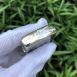 White Tara five-side sterling silver Zippo lighter – second top-edge view of the Tibetan inscription