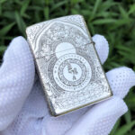 White Tara five-side sterling silver Zippo lighter – straight reverse view showing the mantra wheel and sacred symbols