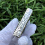 White Tara five-side sterling silver Zippo lighter – side view with lotus, cloud, and botanical engraving