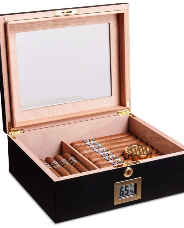 CH024-02 Open wooden cigar humidor with a glass lid, cigars arranged in rows inside and a digital humidity display on the front showing 65%.
