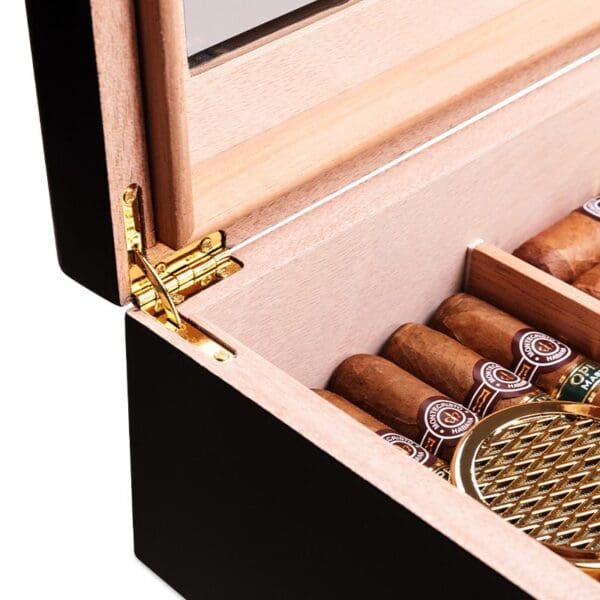 CH024-03 Open wooden cigar humidor showing cigars arranged inside and a gold hinge on the lid