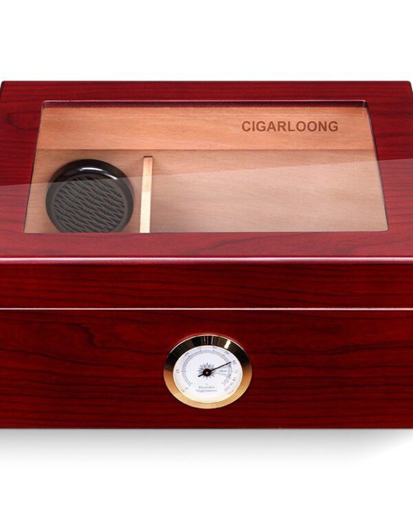 Wooden cigar humidor with a glass lid and a round hygrometer on the front panel.