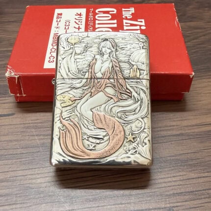 Red-tailed mermaid relief on the King of Ghosts sterling silver Zippo Armor lighter
