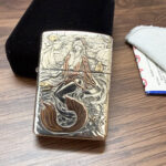 King of Ghosts sterling silver Zippo Armor lighter, red-tailed mermaid side view