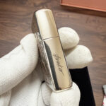 Polished side profile with engraved signature on the mermaid Zippo Armor lighter