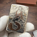 Antiqued mermaid relief and flowing sea details on the sterling silver Armor case