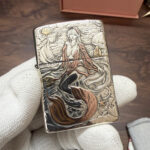 Reverse mermaid scene on the King of Ghosts sterling silver Zippo Armor lighter