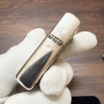 Opposite side profile of the sterling silver mermaid Zippo Armor lighter
