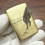 Hinge-side view of the H. R. Giger engraved Zippo lighter