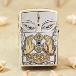 Close-up of the White Tara devotional engraving on the two-tone Zippo Armor case