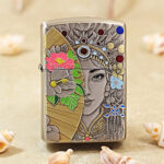 Silver-tone Zippo Armor lighter with an engraved Eastern Beauty portrait and enamel accents