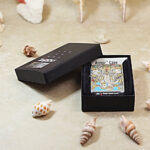 Full presentation view of the engraved Indian Elephant Zippo Armor lighter