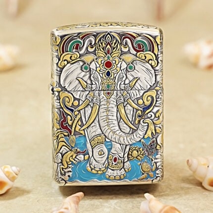 Silver-plated Zippo Armor lighter with an ornamental Indian elephant and gold inlay