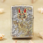 Close-up of the mythical nine-tailed fox engraving on the two-tone Zippo Armor case
